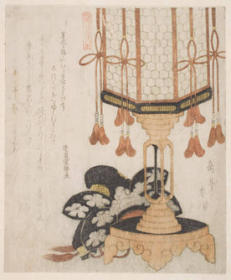 An Ornamental Lantern And A Chinese Crown.