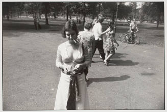 Untitled (Woman in Central Park Lighting a Cigarette)