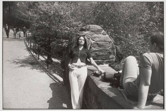 Untitled (Woman Leaning on a Rock in Central Park)