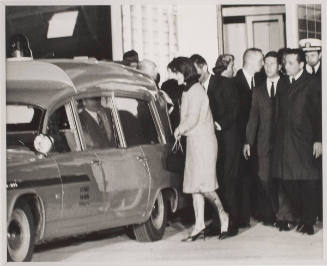 Jacqueline and Robert F. Kennedy Enter an Ambulance with the President's Coffin, Andrews Air Base