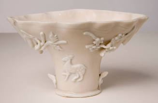Cup in the Shape of a Rhinoceros Horn with Applied Decoration