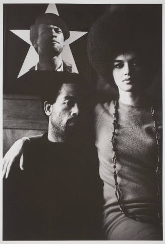 Eldridge and Kathleen Cleaver with Portrait of Huey Newton, Algiers