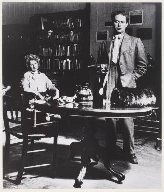 Dylan Thomas and his wife Caitlin, in their Room, Manresa Road, Chelsea, 1944