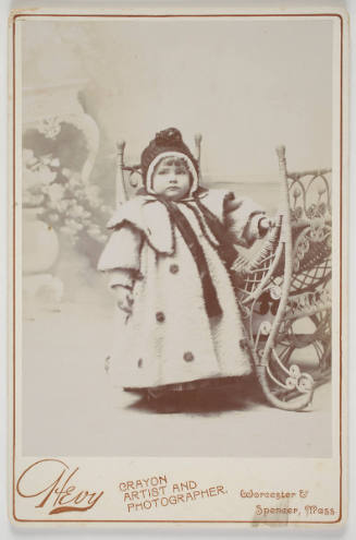 Portrait of a Young Girl in Winter Clothes