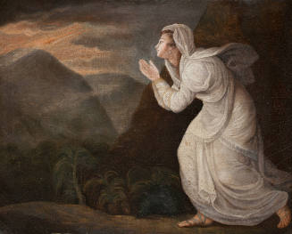 Woman in white in a mountainous landscape