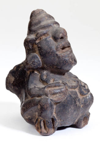 Pottery Fragment (Seated Figure)