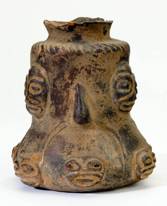 Vase with Heads