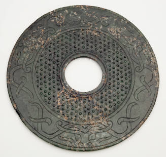 Large Disk with Bands of Small Protuberances and Incised Bovine Masks