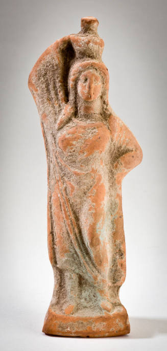 Female Figure with Jar on Head