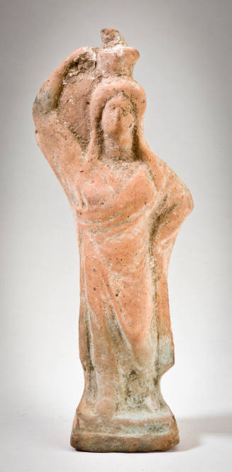 Female Figure with Jar on Head