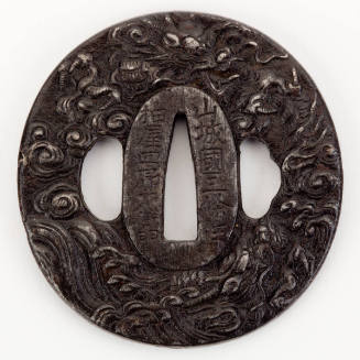 Tsuba (sword guard) with dragon, clouds, and waves