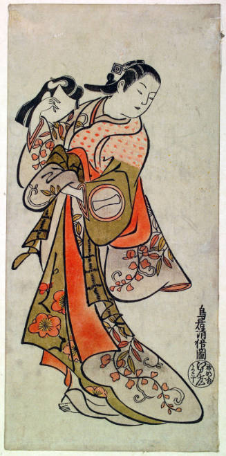 Ichikawa Monnosuke I as a Courtesan Holding the Wig for a Man's Role