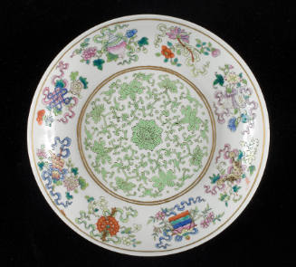 Dish with the Eight Buddhist Symbols and a Central Floral Scroll Medallion